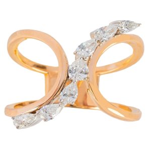 Two Tone Pear Shape 
Diamond Wave Ring